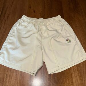 Nike Men’s Shorts Large Pastel Yellow Embroidered Mushroom Swoosh Graphic